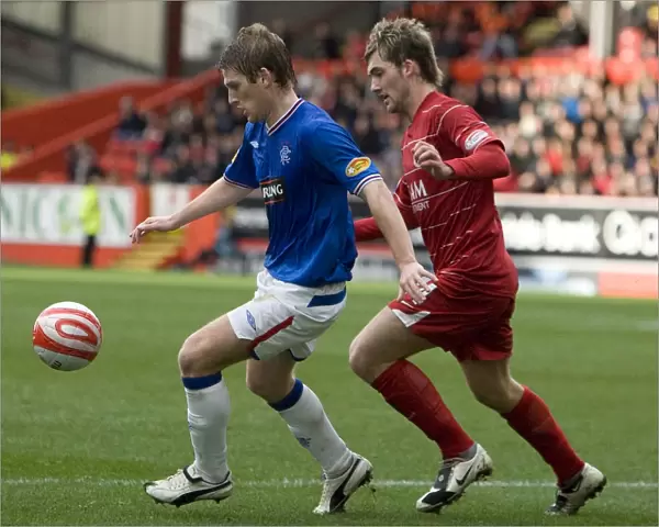 Steven Davis Scores the Thrilling Winner for Rangers at Pittodrie Stadium against Aberdeen in the Clydesdale Bank Premier League