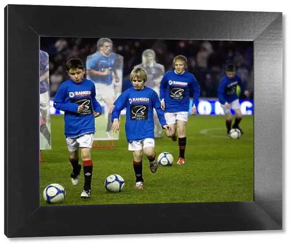 Rangers Kids Shine: A Spectacular Half Time Display of Football Skills at Ibrox (3-0 Rangers vs. St. Johnstone)