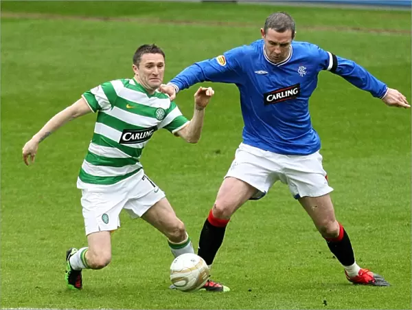 Intense Rivalry: David Weir vs Robbie Keane - A Pivotal Moment in the 1-0 Rangers vs Celtic Clash at Ibrox Stadium