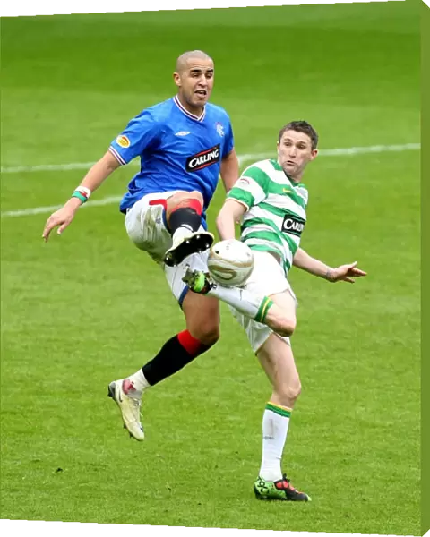Intense Rivalry: Bougherra vs Keane - A Pivotal Moment in the 1-0 Rangers Victory at Ibrox Stadium