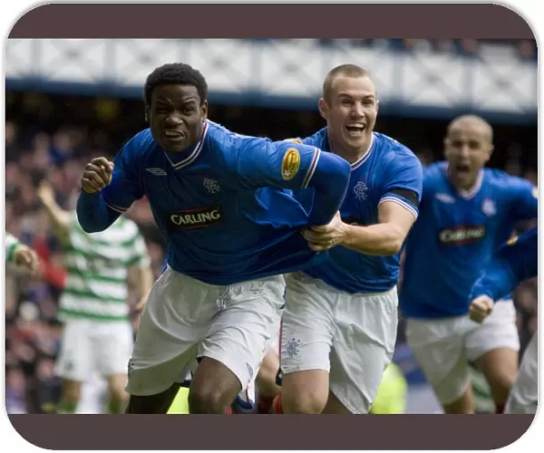 Euphoria Unleashed: Maurice Edu and Kenny Miller's Game-Winning Goal Celebration (Rangers 1-0 Celtic, Clydesdale Bank Premier League, Ibrox)