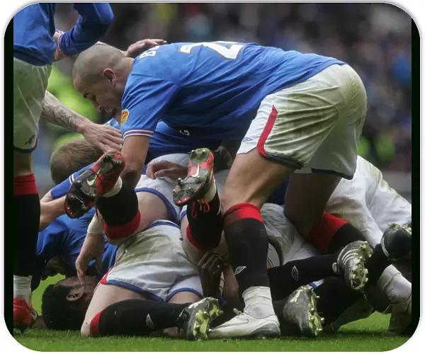 Euphoria at Ibrox: Maurice Edu Scores Game-Winning Goal for Rangers against Celtic (Clydesdale Bank Premier League)