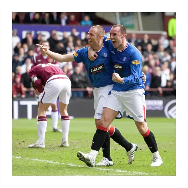 Rangers Miller and Boyd: A Dynamic Duo Celebrates Goal in Hearts 1-4 Rangers Victory (Clydesdale Bank Premier League)
