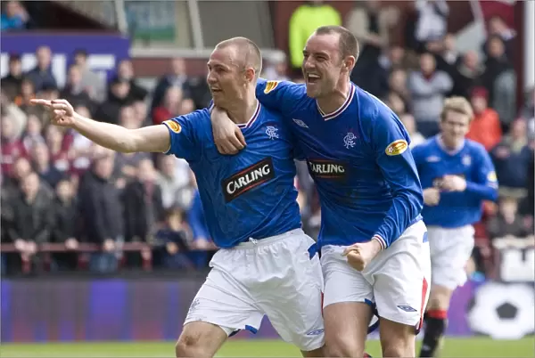 Rangers Double Trouble: Kenny Miller and Kris Boyd's Unforgettable Goal Celebration vs. Heart of Midlothian (4-1)
