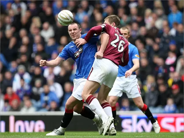 Intense Rivalry: Kris Boyd vs Marius Zaliukas Battle at Ibrox - Rangers 2-0 Hearts, Clydesdale Bank Scottish Premier League