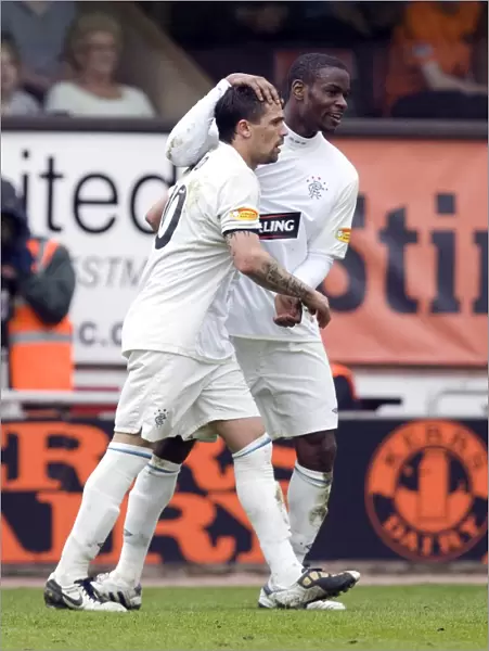 Nacho Novo and Maurice Edu: Unforgettable Moment of Triumph - Rangers 2-1 Win Against Dundee United in the Scottish Premier League at Tannadice Park
