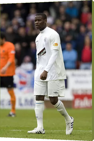 Maurice Edu's Game-Winning Goal: Rangers Triumph Over Dundee United in the Scottish Premier League at Tannadice Park (1-2)