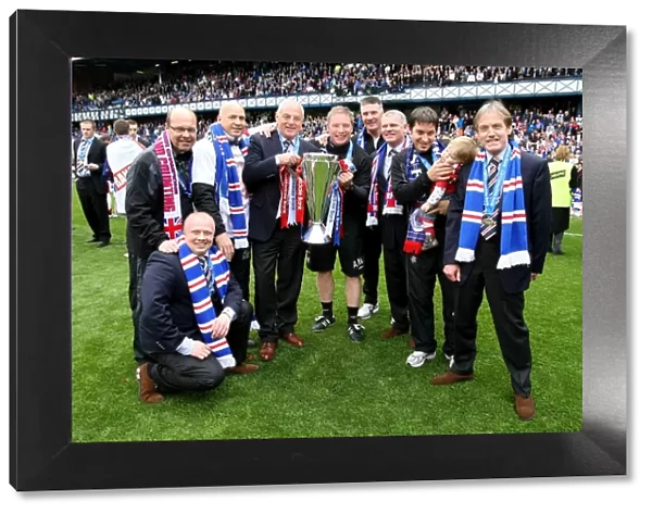 Rangers FC: SPL Champions 2023 - Triumphant Moment: Management and Coaching Staff Celebrate with the Trophy at Ibrox Stadium