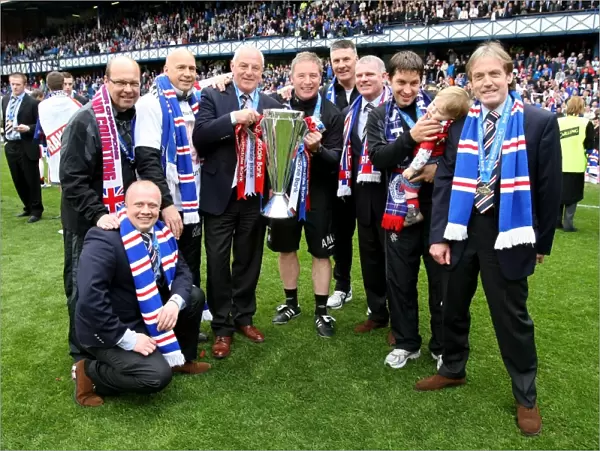 Rangers FC: SPL Champions 2023 - Triumphant Moment: Management and Coaching Staff Celebrate with the Trophy at Ibrox Stadium