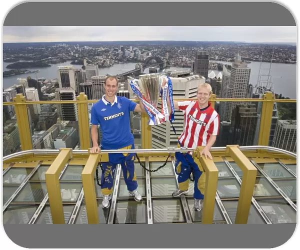 Rangers Whittaker and Naismith Celebrate SPL Title Triumph at Sydney Tower with Harbour Bridge Backdrop (Sydney Festival of Football 2010)