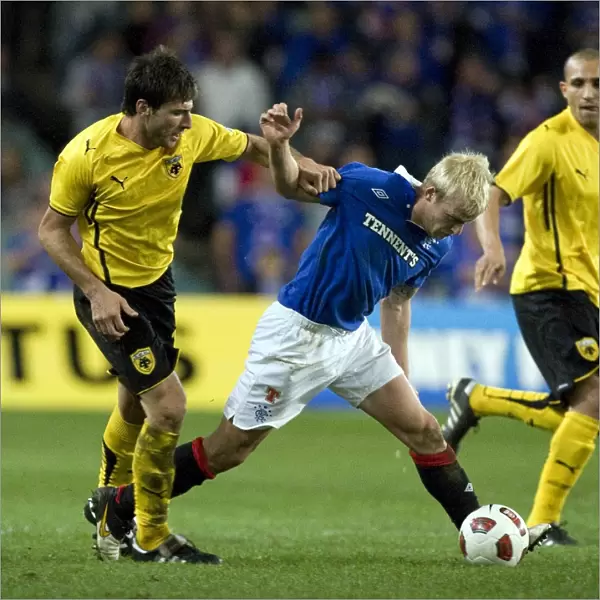 Rangers Steven Naismith Fouls by AEK Athens Ismael Blanco during Sydney Festival of Football 2010 Soccer Match