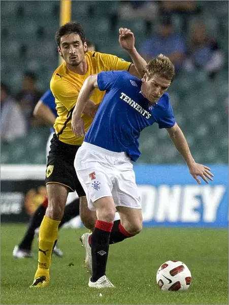Rangers Steven Davis Overpowers AEK Athens Nikos Lyberopoulos at Sydney Festival of Football 2010