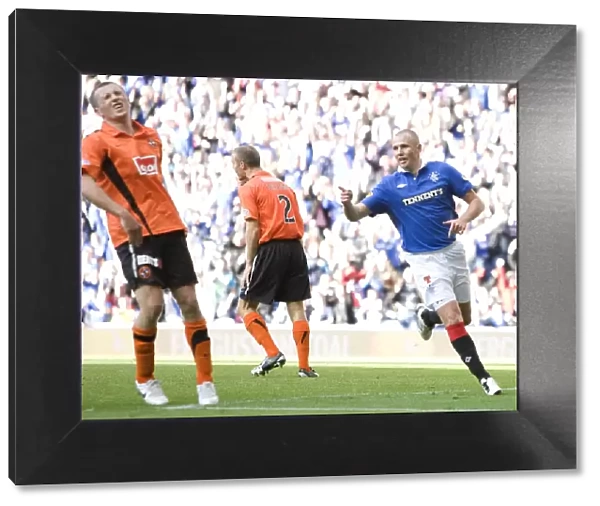 Rangers Kenny Miller's Double Strike: A Memorable Moment in Rangers 4-0 Victory over Dundee United (Scottish Premier League)