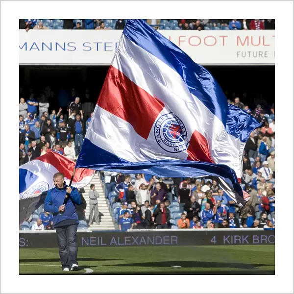 Rangers Flag Bearers Celebrate Glorious 4-0 Victory Over Dundee United at Ibrox Stadium