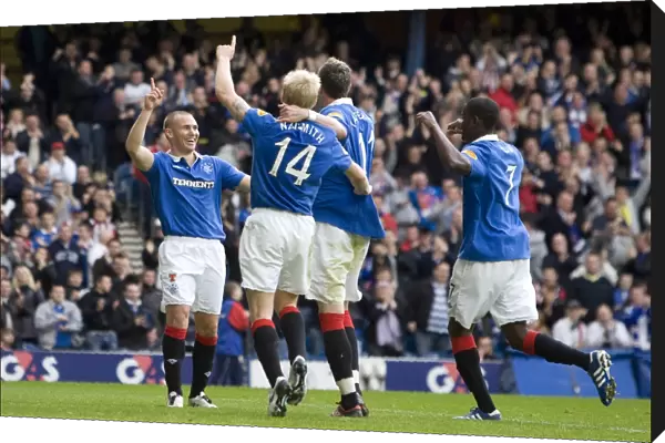 Rangers Kenny Miller's Triumph: A Celebratory Moment as He Scores the Decisive Goal in a 4-1 Victory Over Motherwell at Ibrox