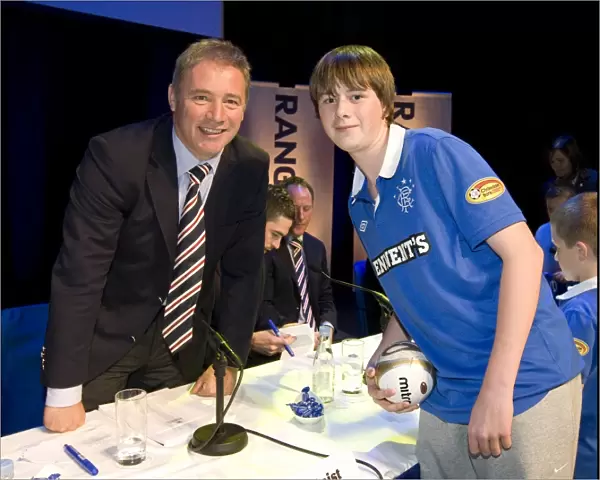 Ally McCoist Engages with a Fan at the 2010 Rangers Junior AGM
