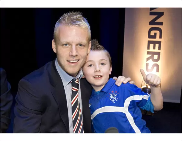Rangers Football Club: Steven Naismith Connects with a Fan at the 2010 Junior AGM