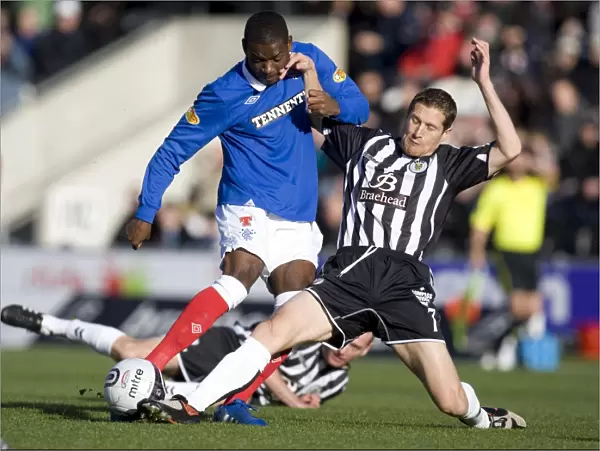 Maurice Edu Tackled by Hugh Murray: A Pivotal Moment in St Mirren vs Rangers (1-3) Clydesdale Bank Scottish Premier League