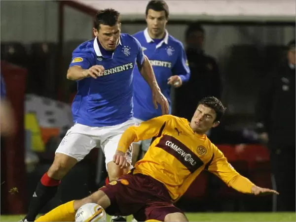 Motherwell vs Rangers: A Clash of Legends - McCulloch and Sutton in Action (4-1 Win for Rangers, Clydesdale Bank Scottish Premier League, Fir Park)