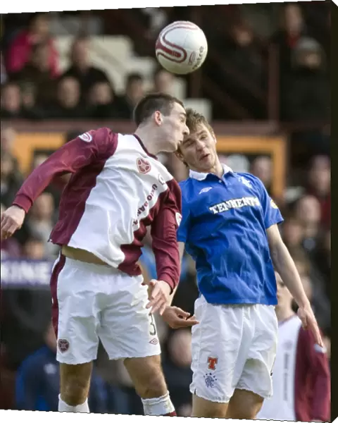 Ness vs Wallace: A Clash in the Clydesdale Bank Scottish Premier League - Heart of Midlothian Takes the Lead (1-0)