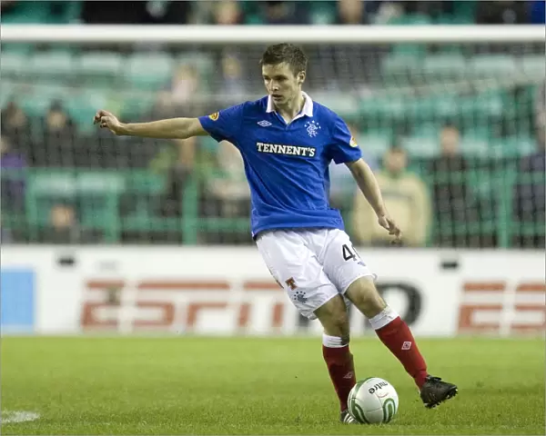 Rangers Jamie Ness Scores the Decisive Goal Against Hibernian in Scottish Premier League (2-0)