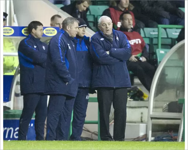 Rangers Triumph: McCoist, McDowall, and Smith Celebrate 0-2 Victory Over Hibernian at Easter Road Stadium (Scottish Premier League)