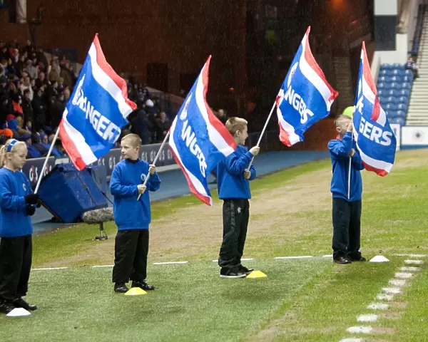 Flag-Bearing Warriors of Ibrox: Rangers Triumph over Hearts in the Scottish Premier League (1-0)