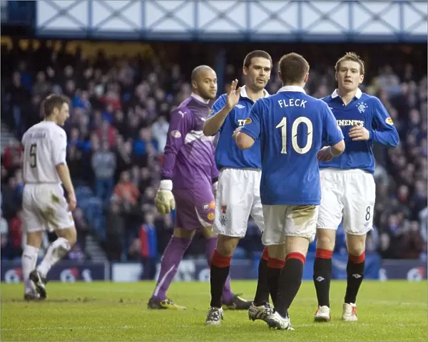 Rangers Triumph: Healy, Davis, and Fleck Celebrate Jelavic's Hat-Trick in a 6-0 Victory