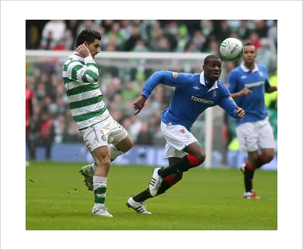 Maurice Edu vs. Beram Kayal: Celtic's Triumph over Rangers - 3-0 Scottish Premier League Clash