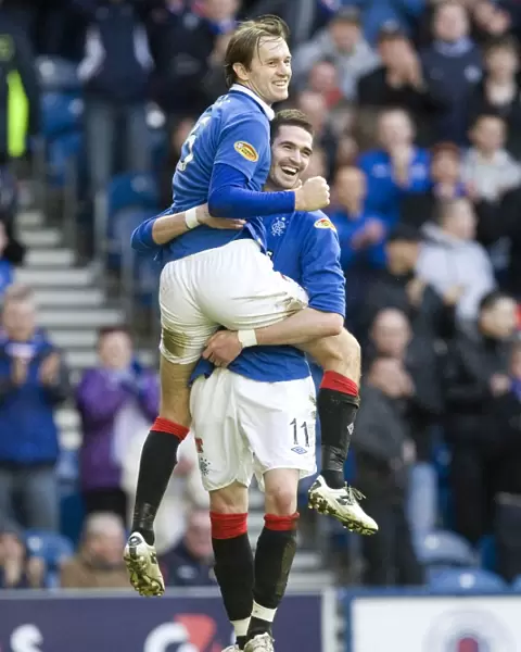 Rangers Sasa Papac and Kyle Lafferty: Celebrating Goals in Rangers 4-0 Victory Over Saint Johnstone at Ibrox Stadium (Clydesdale Bank Scottish Premier League)