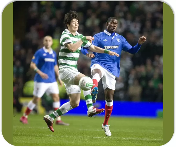 Maurice Edu vs Ki Sung Yueng: A Clash of Midfield Titans in the Scottish Cup Fifth Round Replay: Celtic 1-0 Rangers