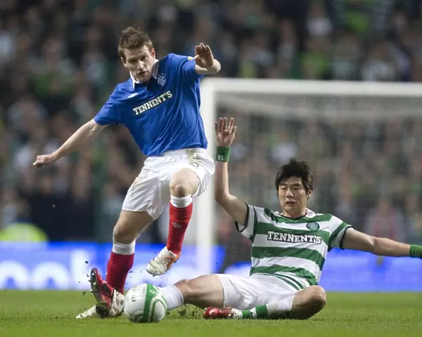 Steven Davis vs. Ki Sung Yueng: A Clash of Midfield Titans in the Scottish Cup Fifth Round Replay: Celtic 1-0 Rangers