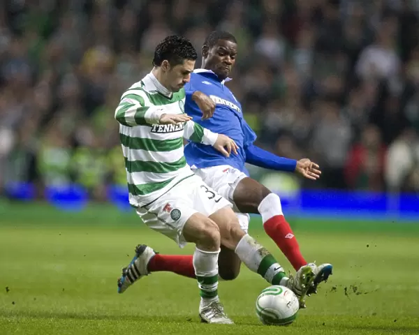Maurice Edu vs. Beram Kayal: A Football Battle in the Scottish Cup Fifth Round Replay - Celtic Leads 1-0