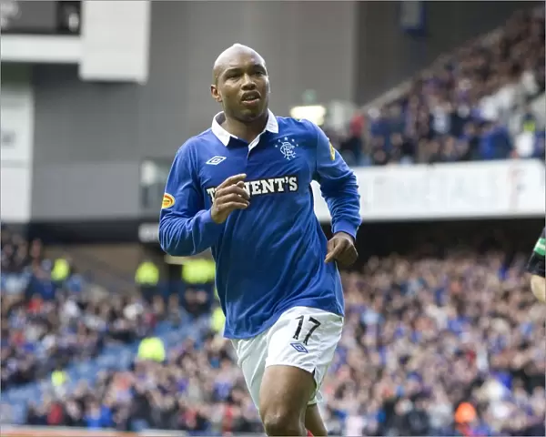 Diouf's Dramatic Ibrox Stunner: Rangers Edge Past Kilmarnock 2-1 (Scottish Premier League)