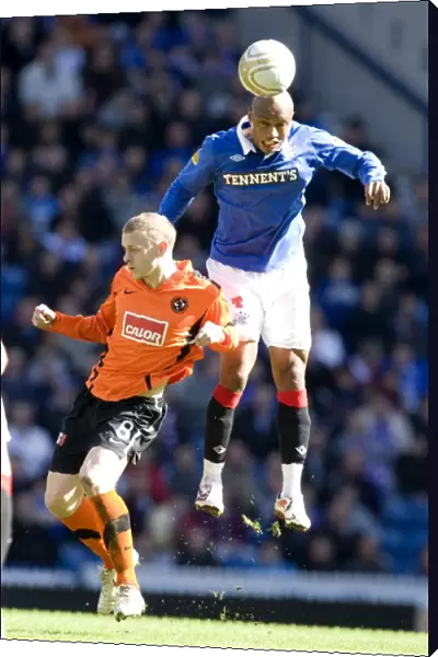 Thrilling 3-2 Upset: Diouf vs Robertson at Ibrox - Dundee United's Victory Over Rangers
