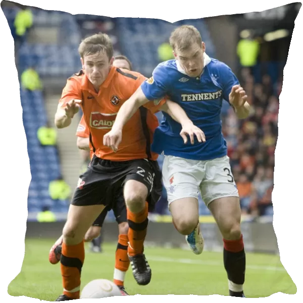 Thrilling Comeback: Dundee United's Wylde and Watson Stun Rangers with 2-3 Victory at Ibrox Stadium
