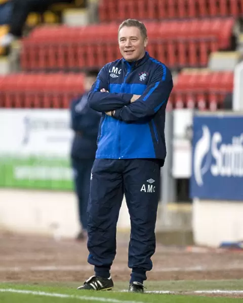 Ally McCoist and Rangers Secure a 2-0 Victory over St. Johnstone in the Scottish Premier League at McDiarmid Park