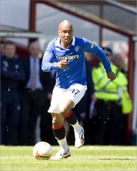 Five-Star Diouf: Rangers Dominance - 5-0 Over Motherwell in Scottish Premier League