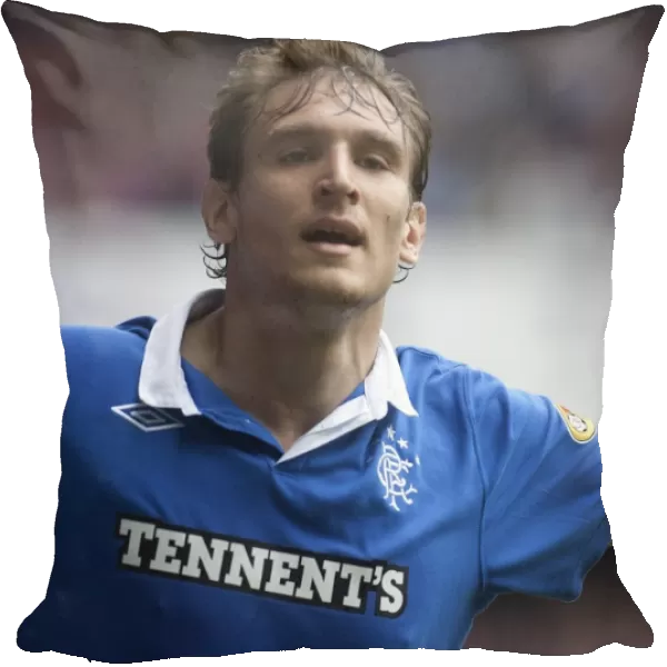 Rangers Jelavic Scores First Goal in Impressive 4-0 Win Over Heart of Midlothian (Clydesdale Bank Scottish Premier League, Ibrox Stadium)
