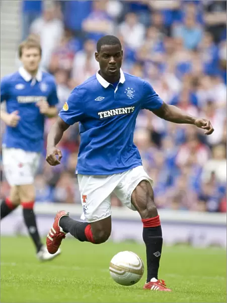Maurice Edu's Dominant Performance: Rangers 4-0 Hearts in Clydesdale Bank Scottish Premier League