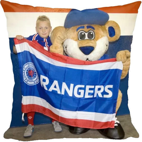 Rangers Football Club: Family Fun in the Broomloan Stand Celebrating a 4-0 Victory over Hearts (Clydesdale Bank Scottish Premier League)