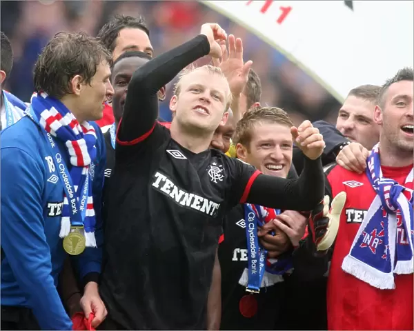Rangers Champions League Title Win: Jelavic, Naismith, Davis, and McGregor's Triumphant Celebration at Rugby Park