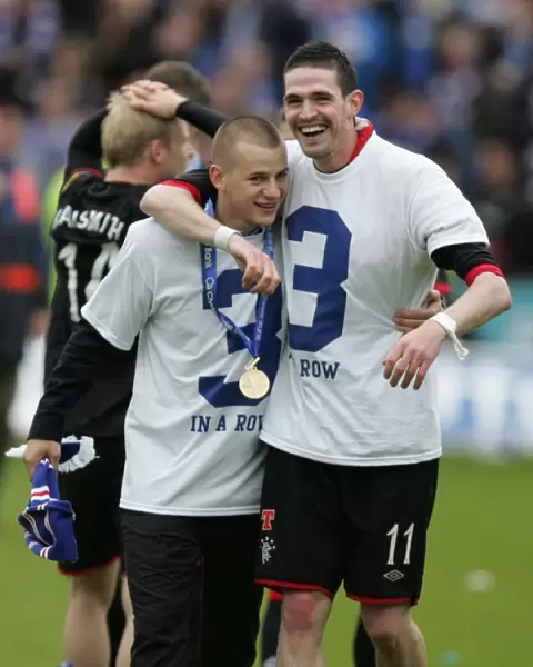 Rangers Football Club: Champions Kyle Lafferty and Vladimir Weiss Celebrate SPL Victory at Rugby Park