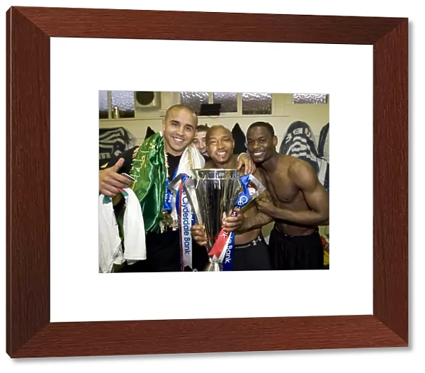 Rangers Football Club: Celebrating SPL Championship Glory - Exclusive Image of Bougherra, Hutton, Diouf, and Edu