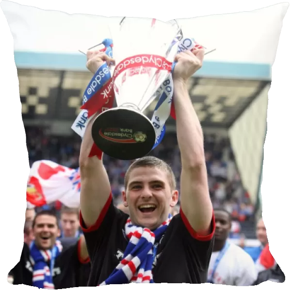 Rangers Football Club: Kyle Hutton's Triumphant Moment - Celebrating the 2010-11 SPL Championship Win Against Kilmarnock at Rugby Park