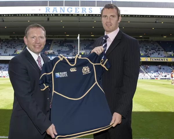 Rangers vs. Heart of Midlothian: A Football Rivalry - Al Kellock and Andy Nicol's Clash in the Clydesdale Bank Scottish Premier League at Ibrox Stadium