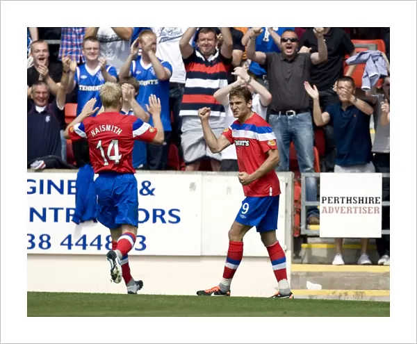 Rangers Nikica Jelavic Celebrates Glory: 2-0 Win Over St. Johnstone in Scottish Premier League