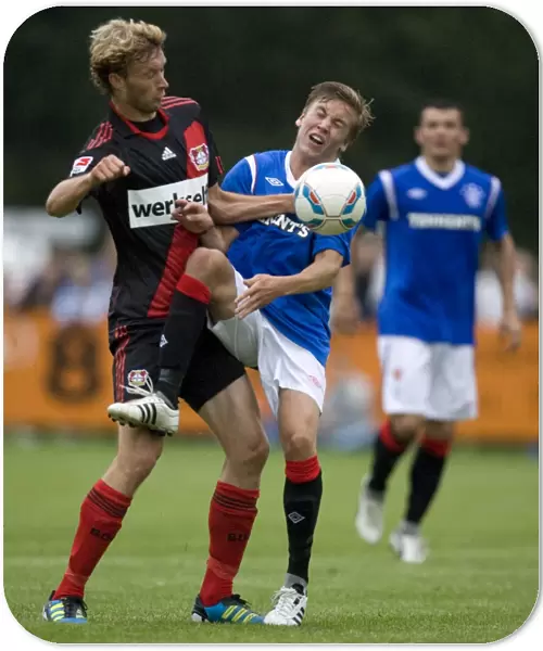 Rangers vs. Bayer Leverkusen: Thomas Bendiksen vs. Simon Rolfes - A Pre-Season Battle at Takko Stadium (2-0 in Favor of Bayer Leverkusen)