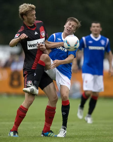 Rangers vs. Bayer Leverkusen: Thomas Bendiksen vs. Simon Rolfes - A Pre-Season Battle at Takko Stadium (2-0 in Favor of Bayer Leverkusen)