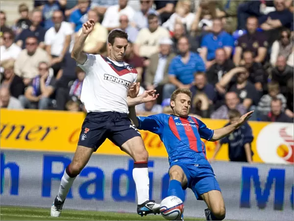 Rangers Lee Wallace vs. Inverness Caledonian Thistle's Chris Hogg: Intense Clash in 2-0 Rangers Victory at Tulloch Caledonian Stadium